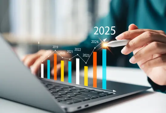 Person analyzing growth chart on laptop.